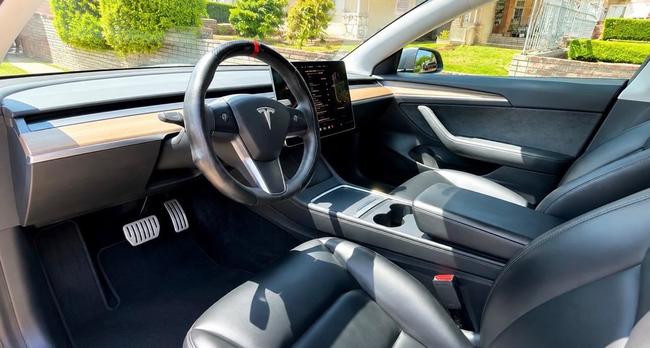 Tesla Model 3 interior — dash, screen and steering wheel detailed