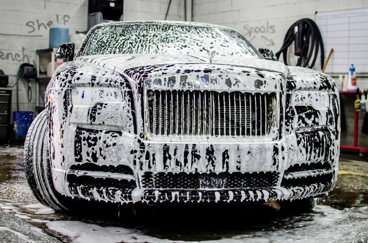 Rolls-Royce covered in foam during a pre-wash